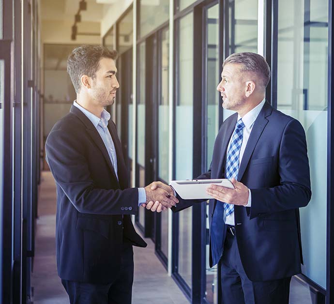 Tax professionals shaking hands