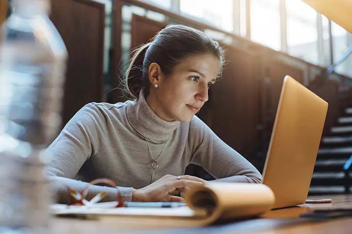 Woman reading on a computer