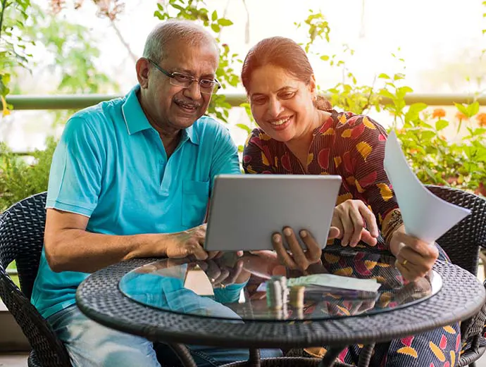 Couple looking at a computer