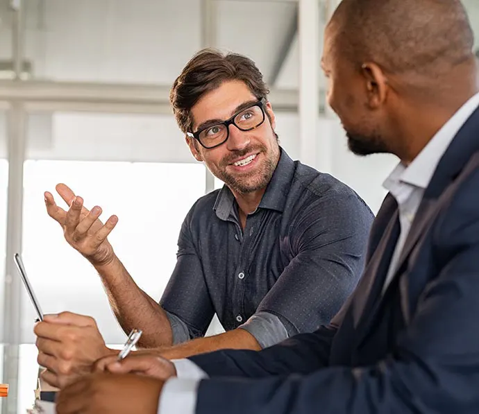 Two tax professionals discussing a case